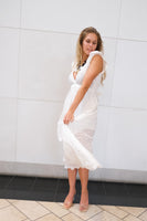 womans-white-sleeveless-long-dress.jpg